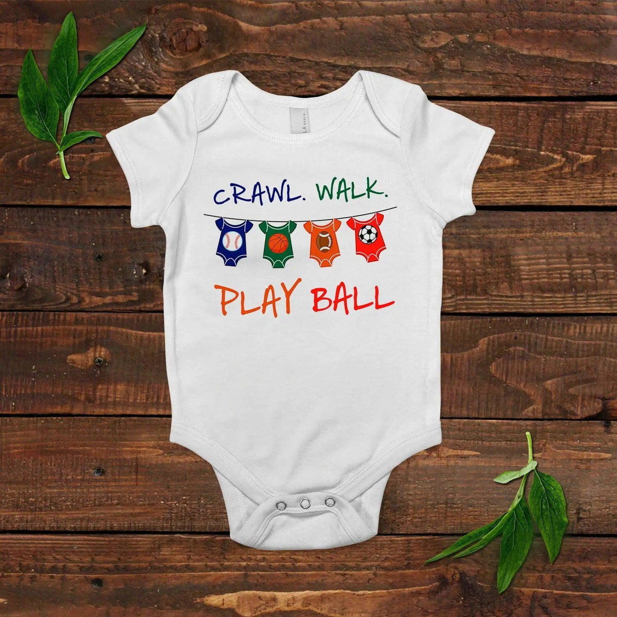 White baby short-sleeve bodysuit with colorful sports icons and slogan print