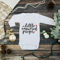 White long-sleeve baby bodysuit with “Little answered prayer” print.