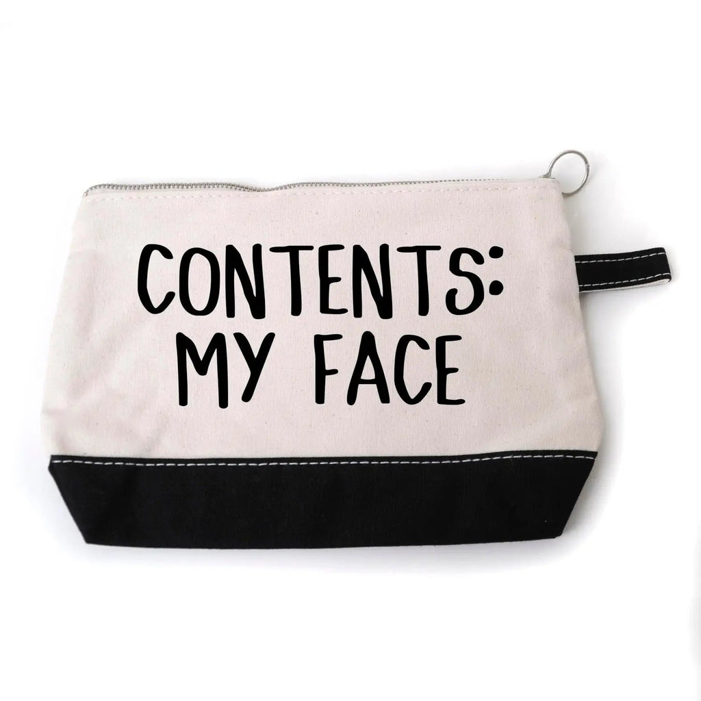 Beige canvas cosmetic pouch with black bottom, zipper top, keyring, text CONTENTS: MY FACE