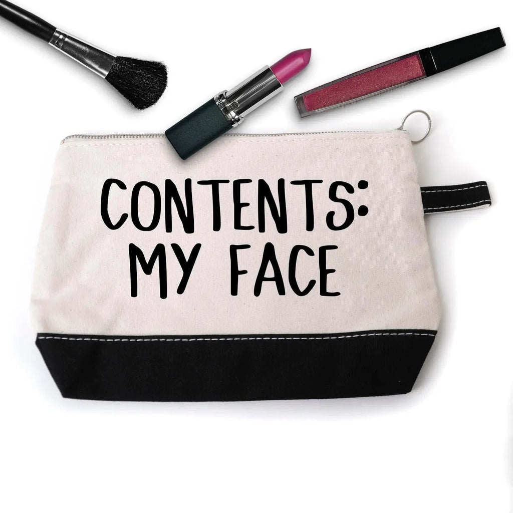 Beige canvas cosmetic pouch with black bottom, zip, CONTENTS: MY FACE, makeup brushes above