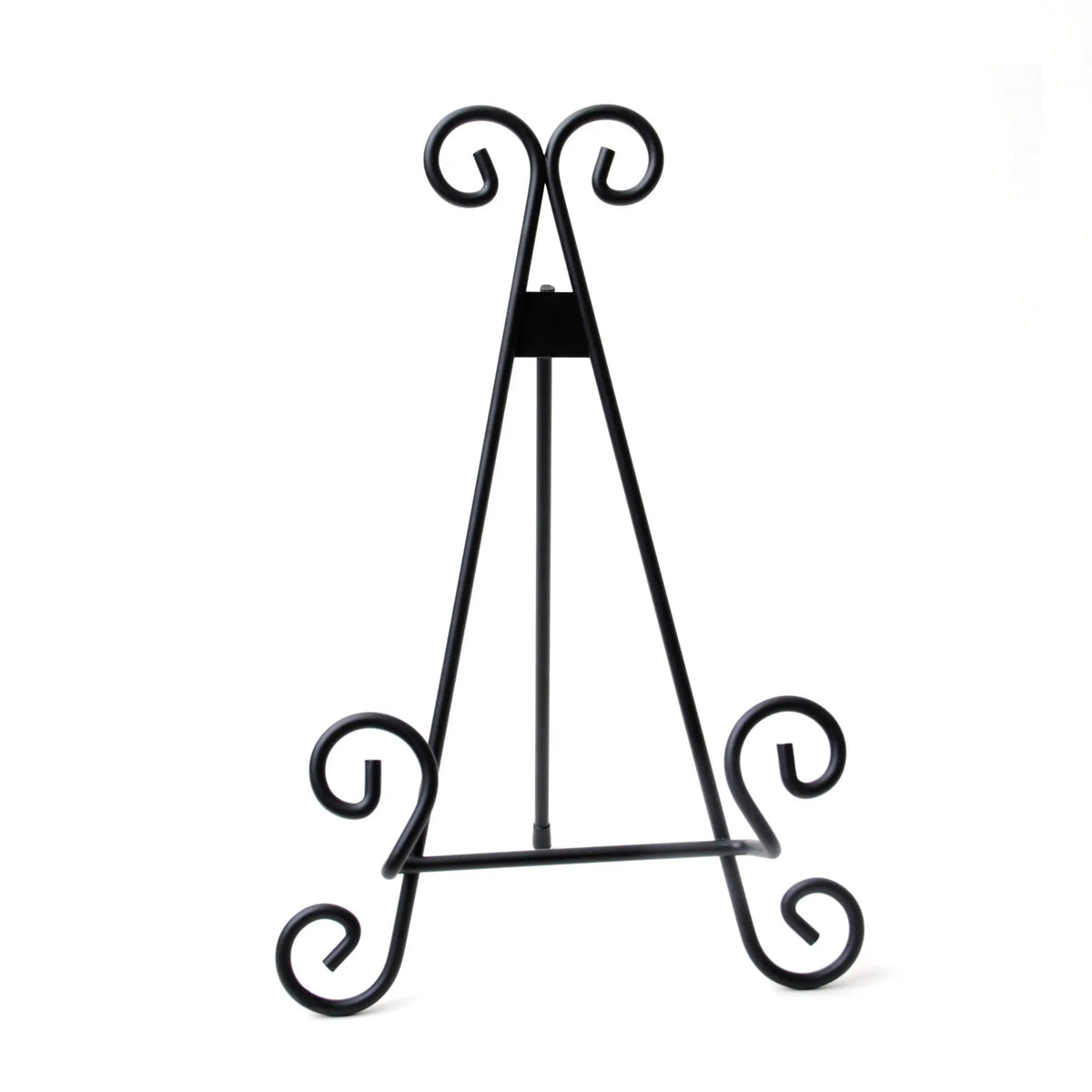 Black metal display stand for a cutting board with curled feet