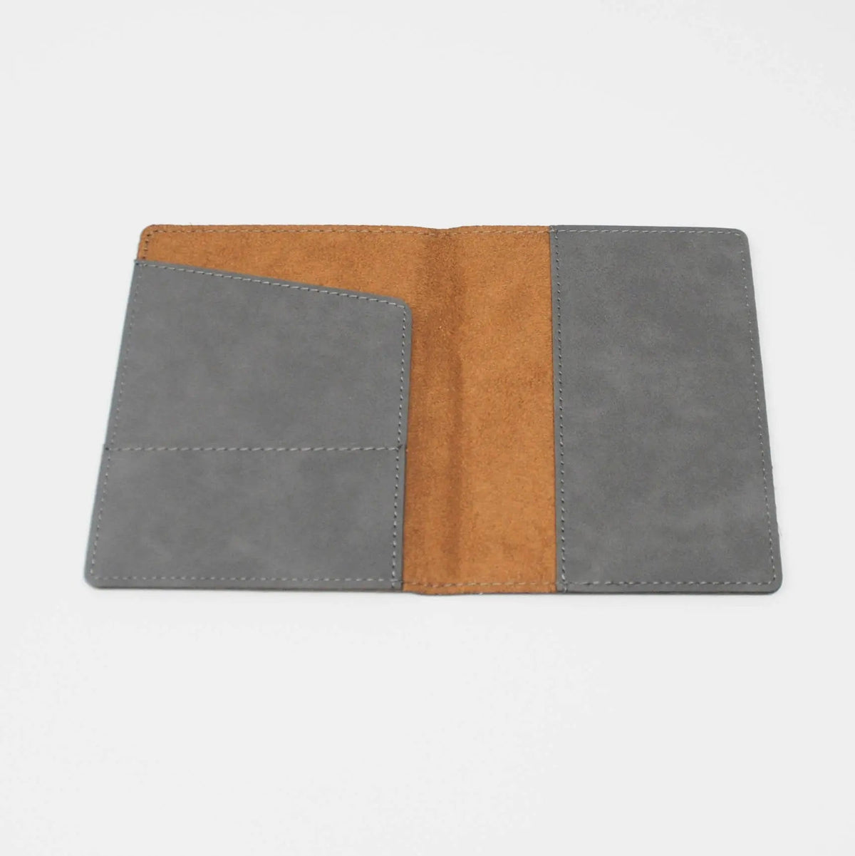 Tan passport holder open view with gray front panels and visible stitching
