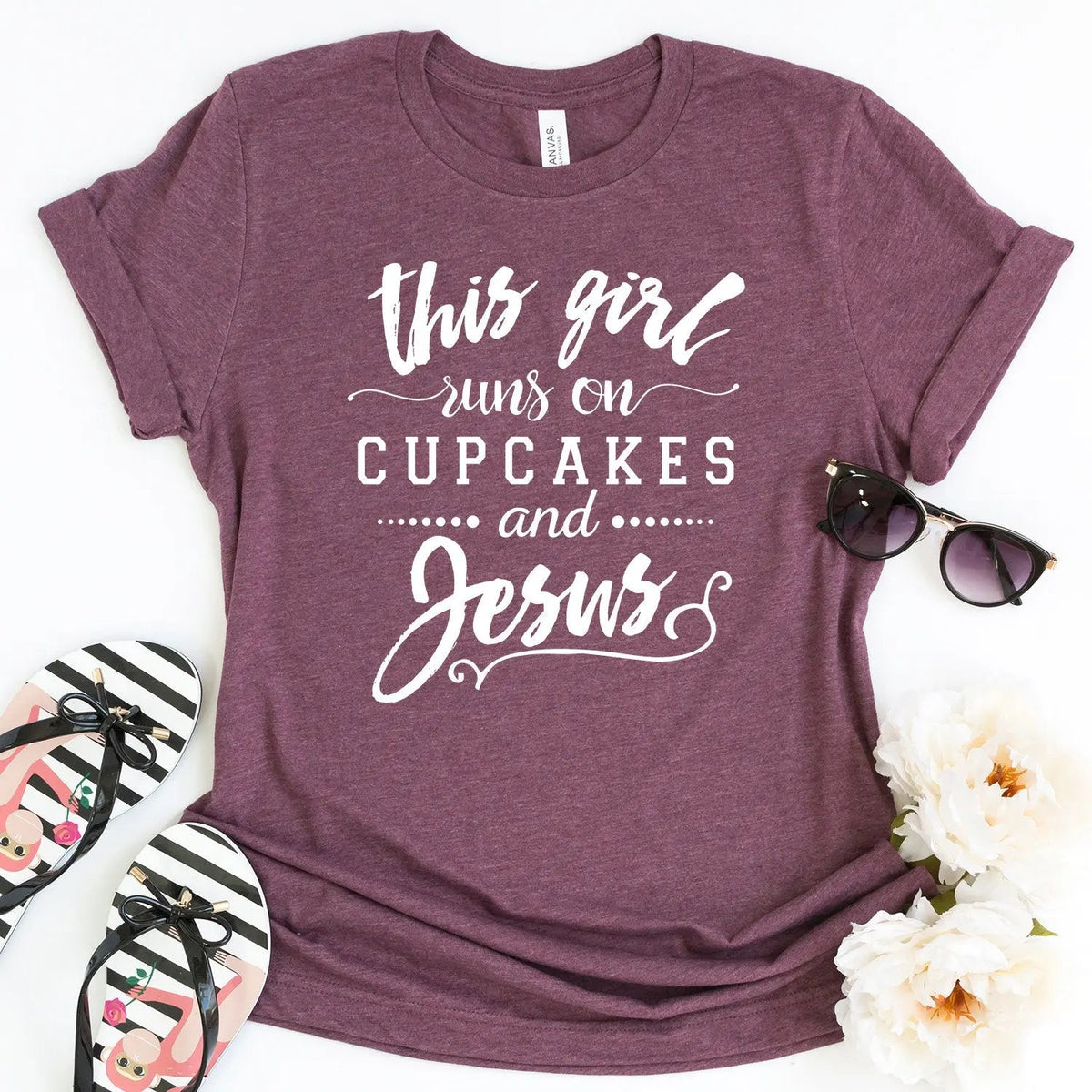 Maroon Christian women's crewneck T-shirt with ‘This girl runs on cupcakes and Jesus’ print