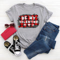 Gray women's graphic T-shirt with red buffalo plaid 'Be My Valentine' heart design