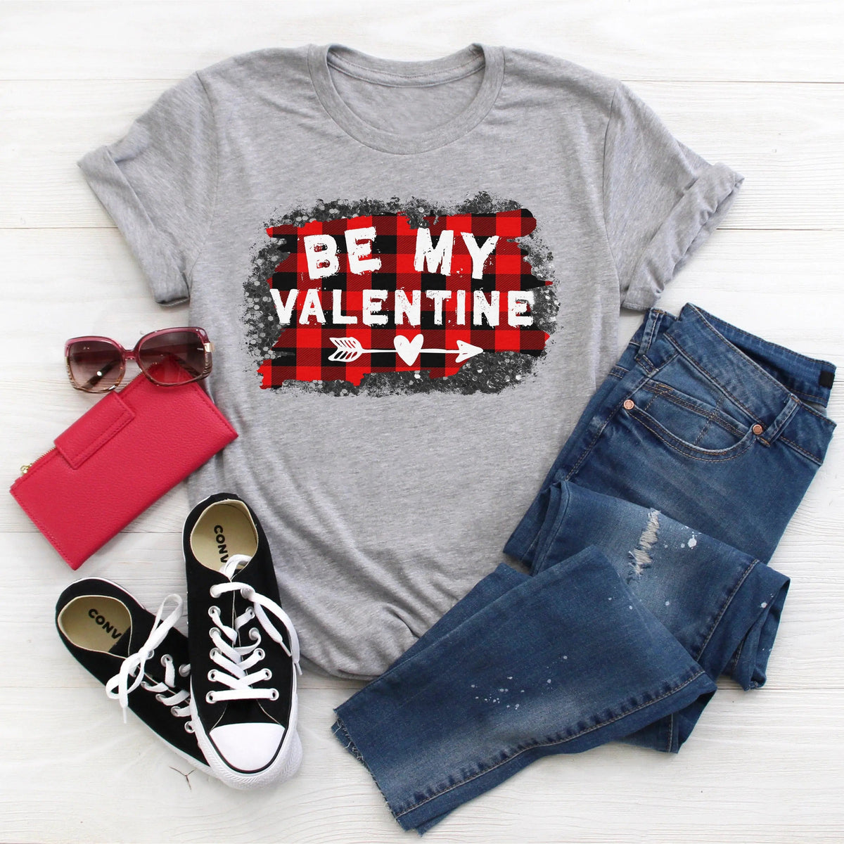 Gray women's graphic T-shirt with red buffalo plaid 'Be My Valentine' heart design