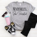Heather gray women's graphic tee with bold black 'Nevertheless, She Persisted' print