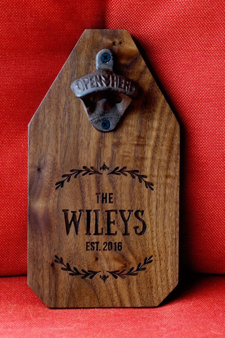 Dark wood bottle opener sign with metal opener and engraved “THE WILLEYS EST. 2016”.