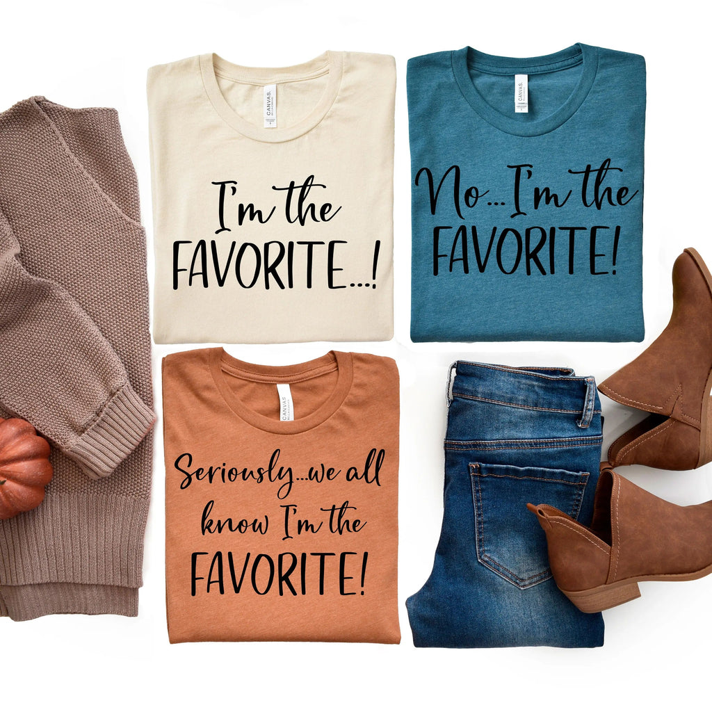 Unisex graphic T-shirts layout: cream and teal tops, orange and brown bottoms, 'FAVORITE!'