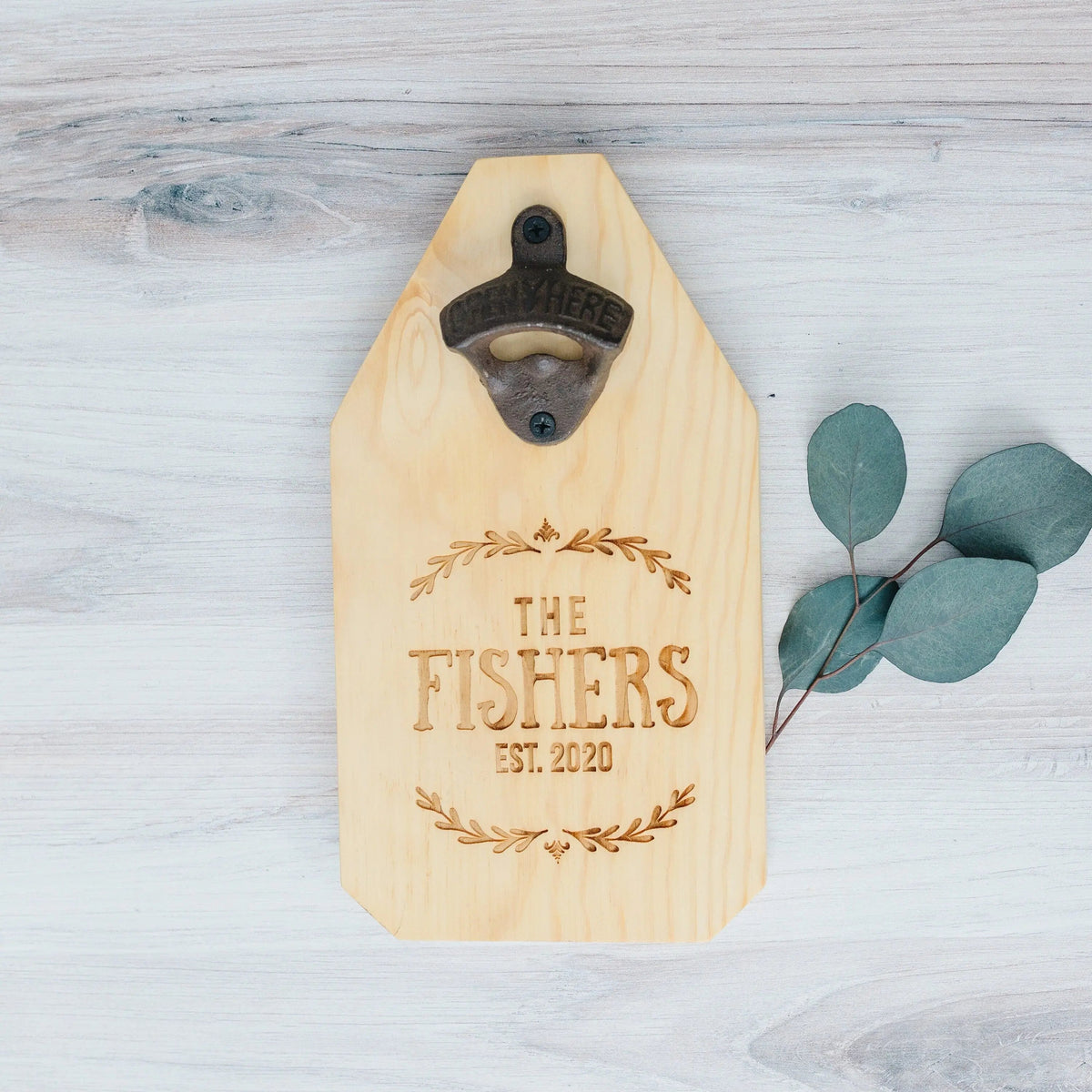 Light pine wood bottle opener sign with metal opener and engraved “THE FISHERS EST. 2020”.