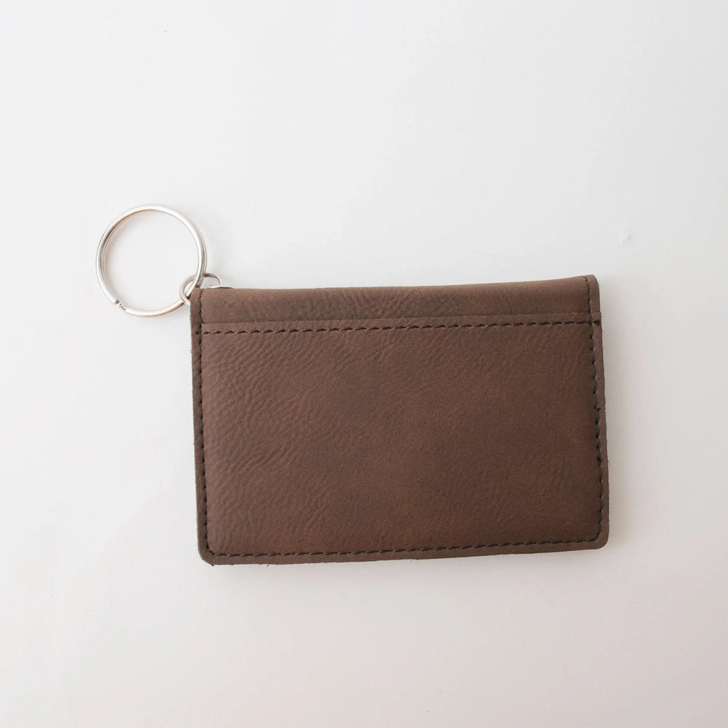 Dark brown leather keychain wallet with metal ring, front view