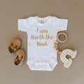 White newborn short-sleeve onesie with gold 'I was Worth the Wait' script
