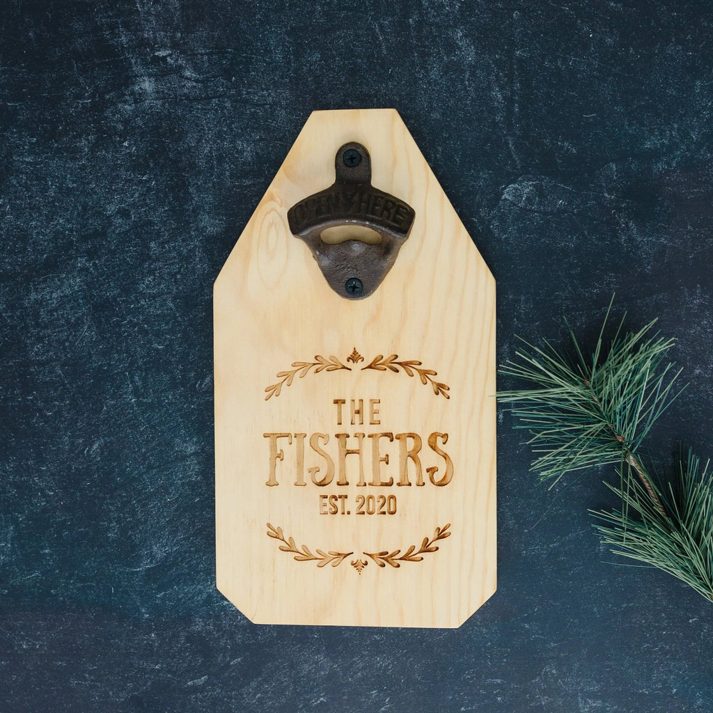 Light pine wood bottle opener sign with metal opener and engraved “THE FISHERS EST. 2020”.