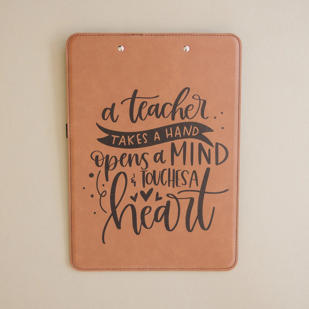 Brown leather clipboard front with teacher quote graphic and two top mounting holes