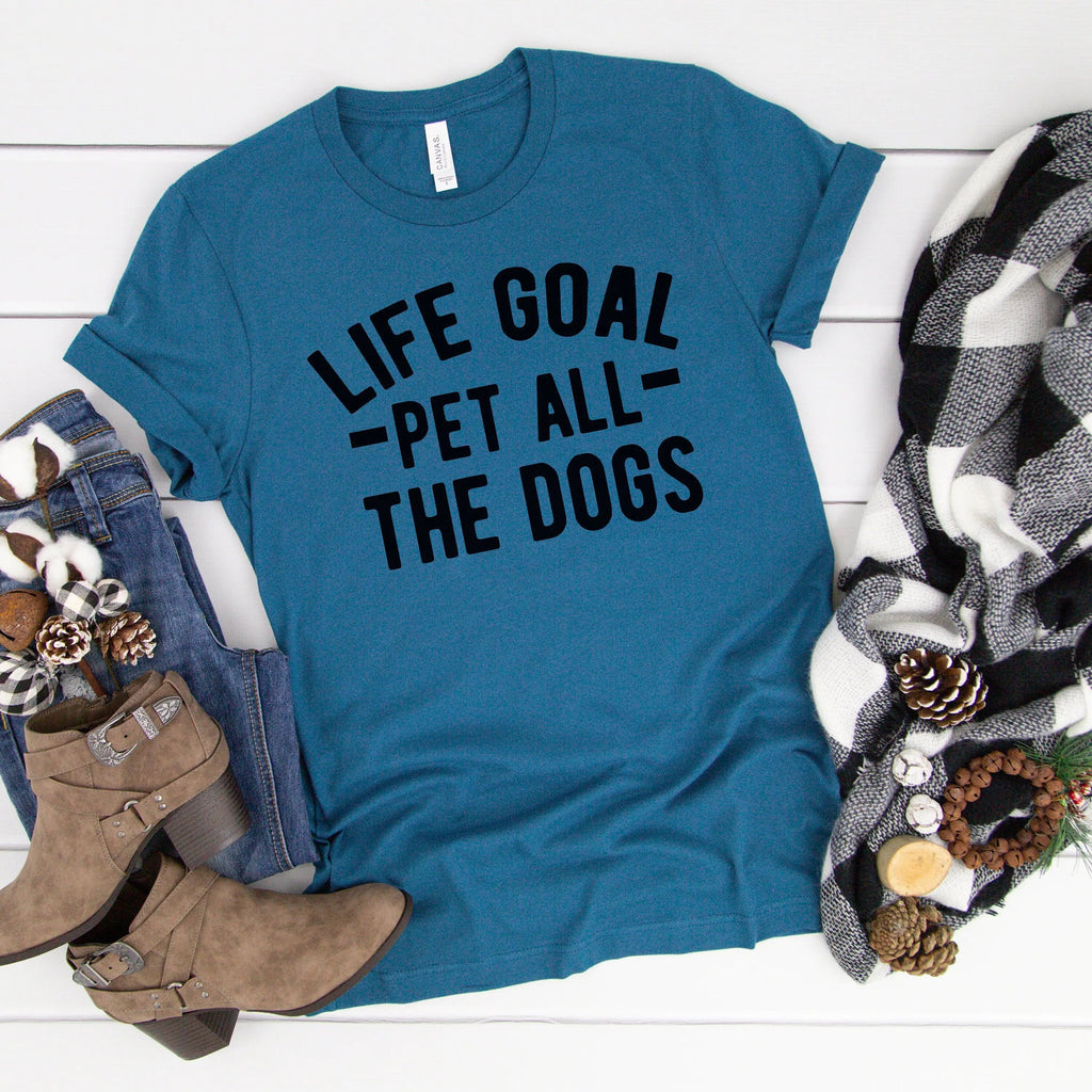Teal T-shirt with black “Life Goal - Pet All - The Dogs” graphic, crew neck