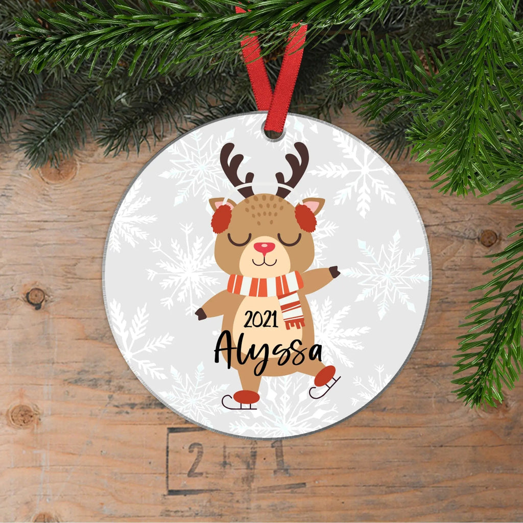 Personalized 2021 round reindeer Christmas ornament with red hanging ribbon, name Ayssa