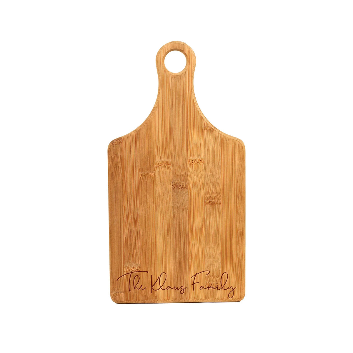 Wood charcuterie board with hanging hole and engraved "The Christen" family text.