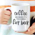 White coffee mug with “Coffee because it’s too early for beer” text