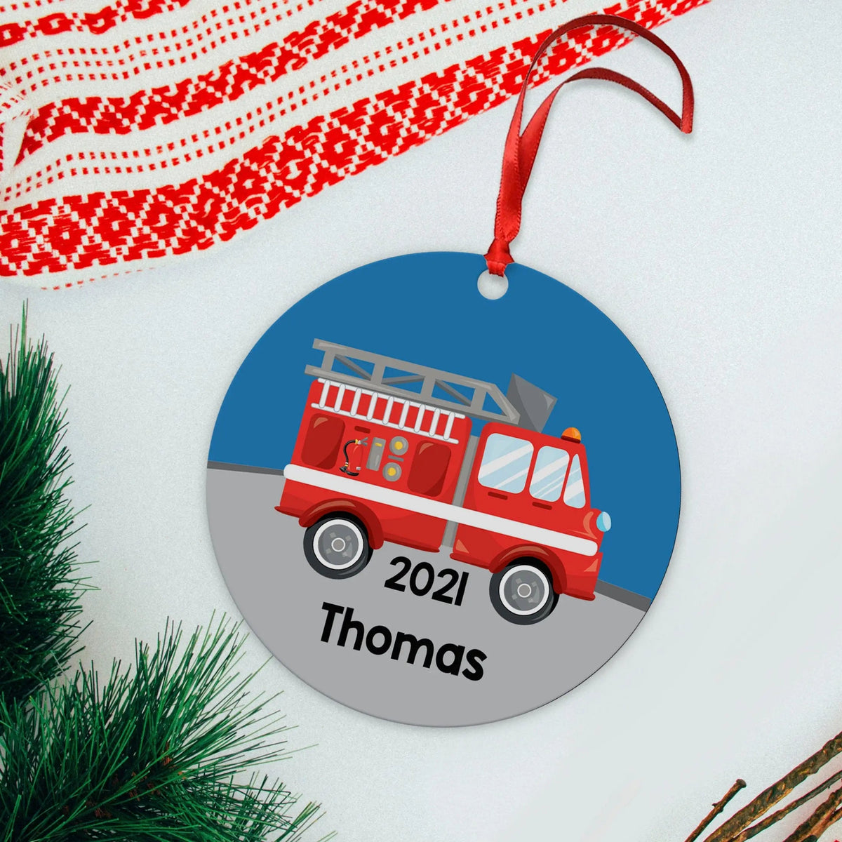 Personalized fire truck ornament with red truck, 2021, and name Thomas, hanging