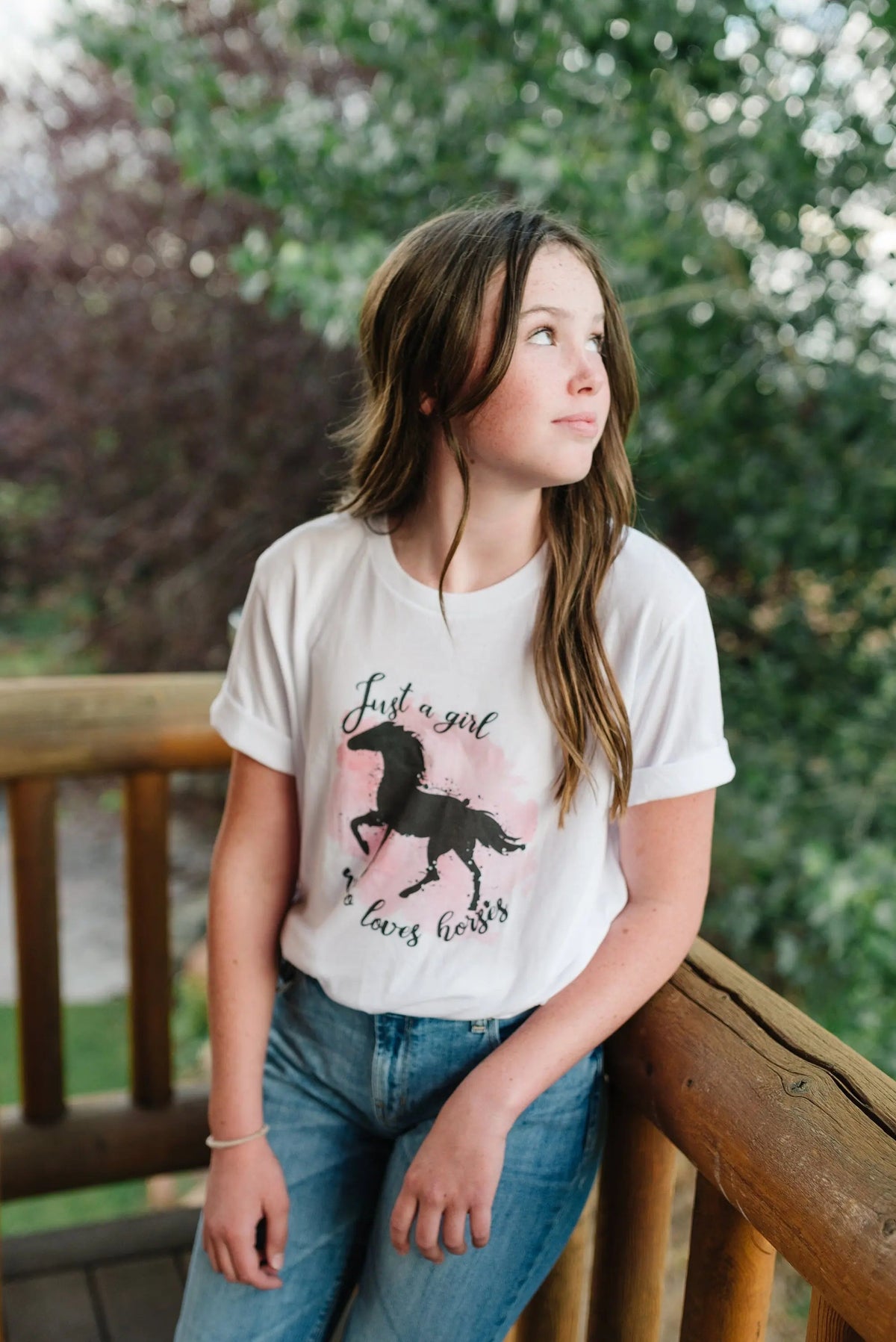 White girls horse T-shirt with black horse silhouette and pink splash front print