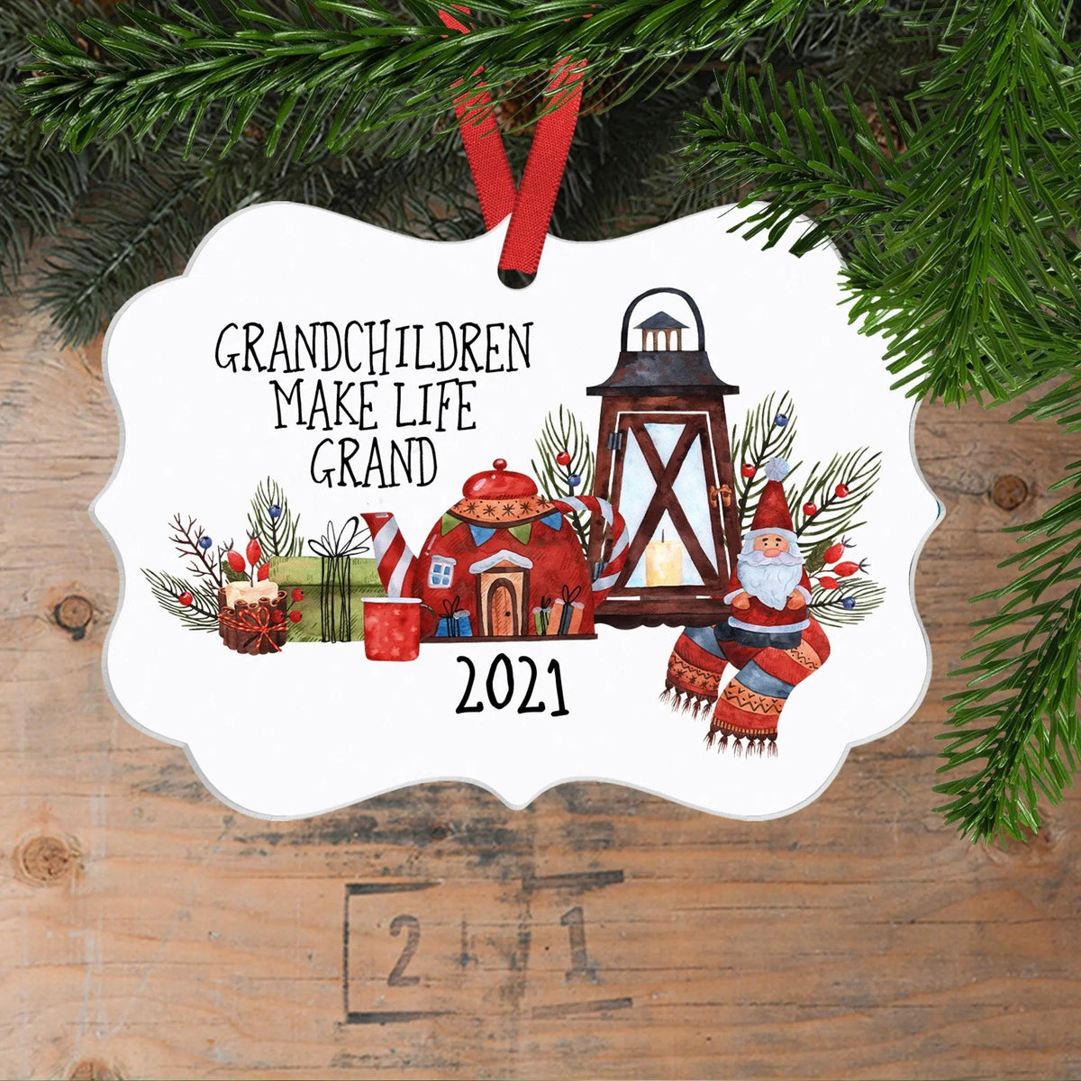 White scalloped Christmas ornament with red ribbon, illustrated grandparents message and 2021