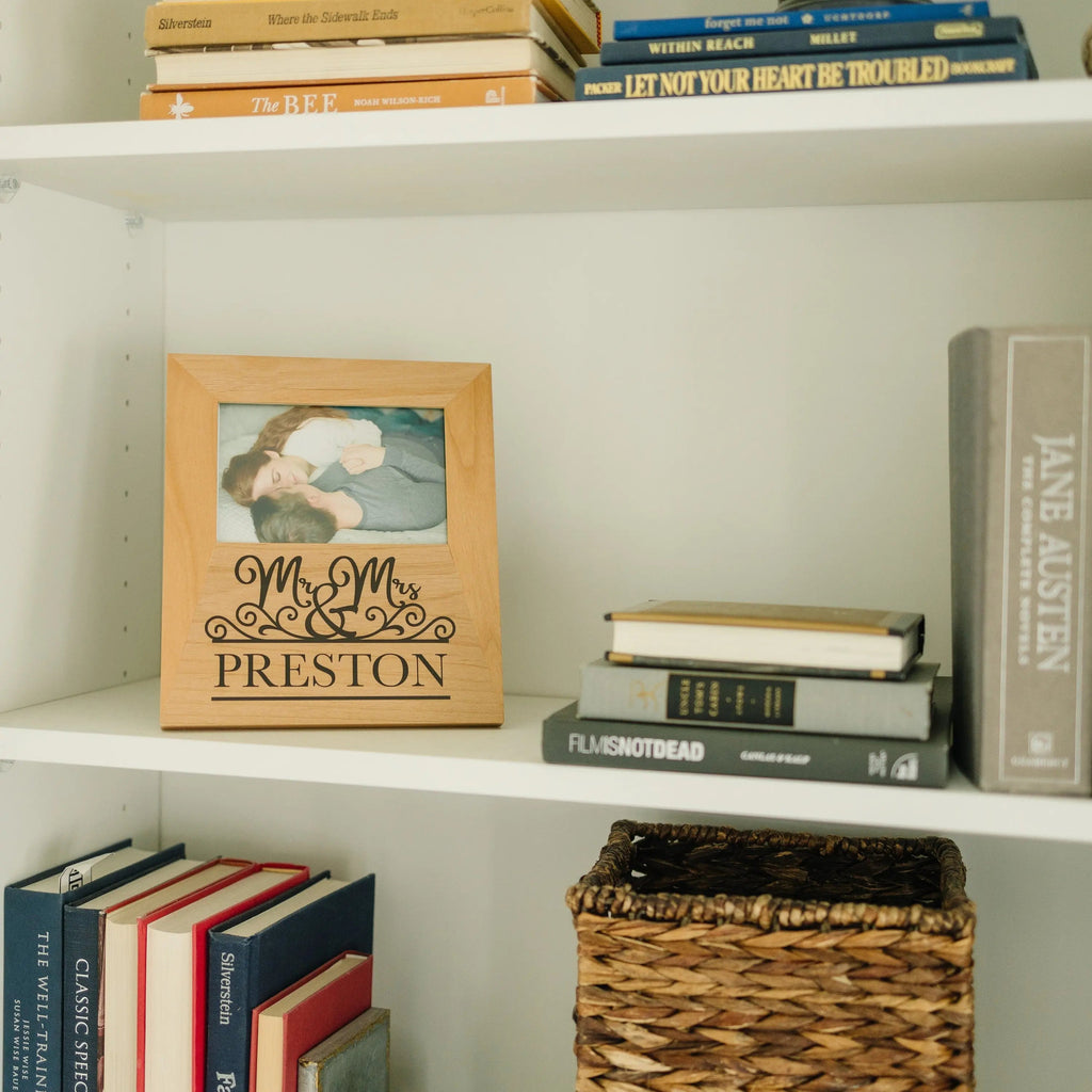 Personalized wood photo frame with Mr & Mrs Preston design on a shelf
