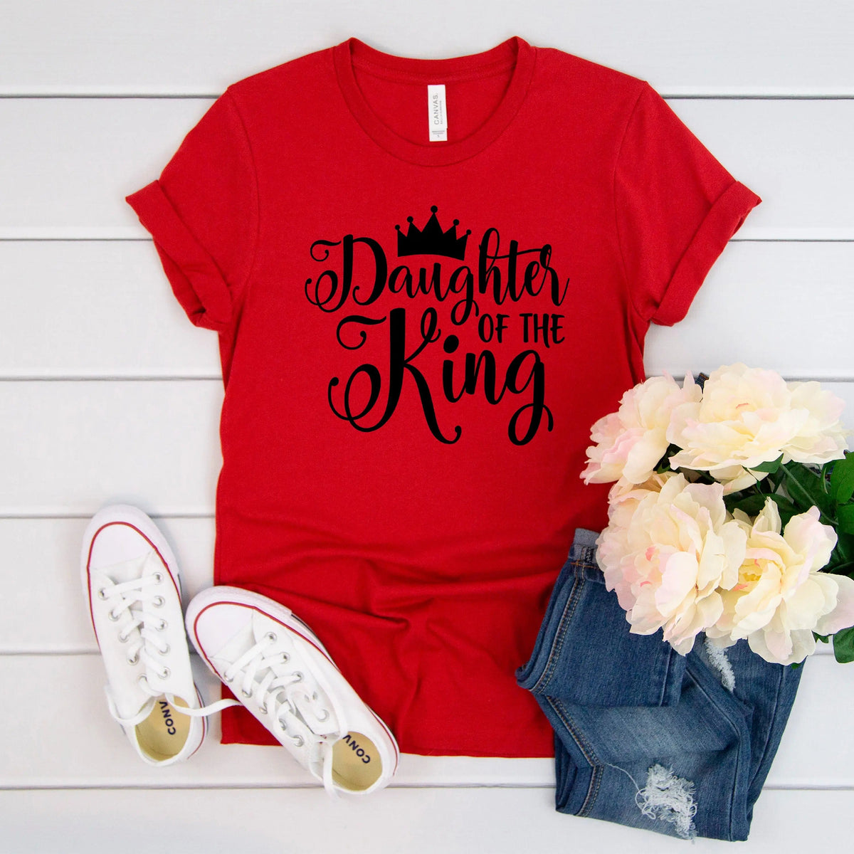 Red women's Christian T-shirt with black 'Daughter of the King' crown graphic