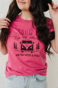 Women’s pink graphic t-shirt with camper van, trees, and “Life is short” text