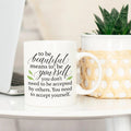 White ceramic inspirational mug with self-care quote and curved handle