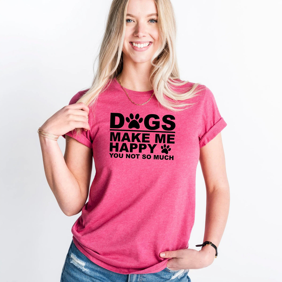 Pink unisex T-shirt for dog lovers with paw print graphic and 'Dogs Make Me Happy'