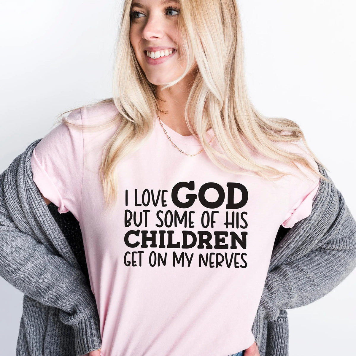 Light pink T-shirt with black “I LOVE GOD… CHILDREN” message, crew neck, short sleeves