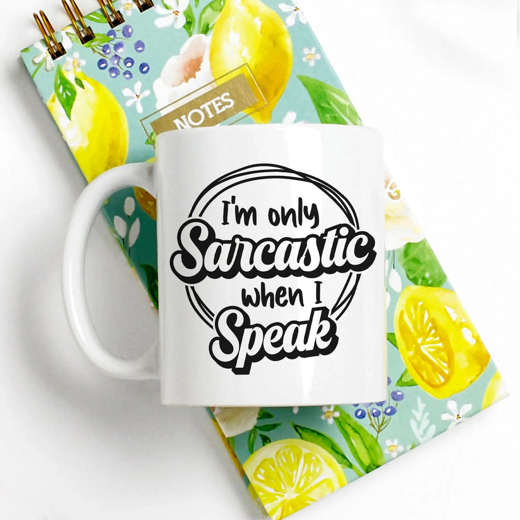 White ceramic coffee mug with 'I'm only Sarcastic when I Speak' black quote