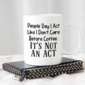 White ceramic coffee mug with quote: "People say I act... It's not an act"
