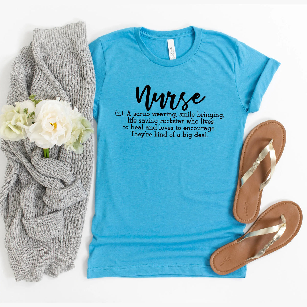 Aqua womens nurse T-shirt with Nurse script logo and inspirational quote