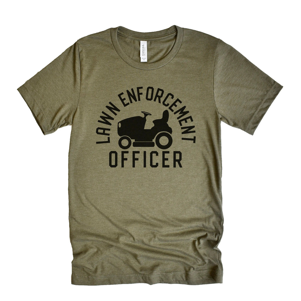 Olive unisex T-shirt with black “Lawn Enforcement Officer” tractor graphic