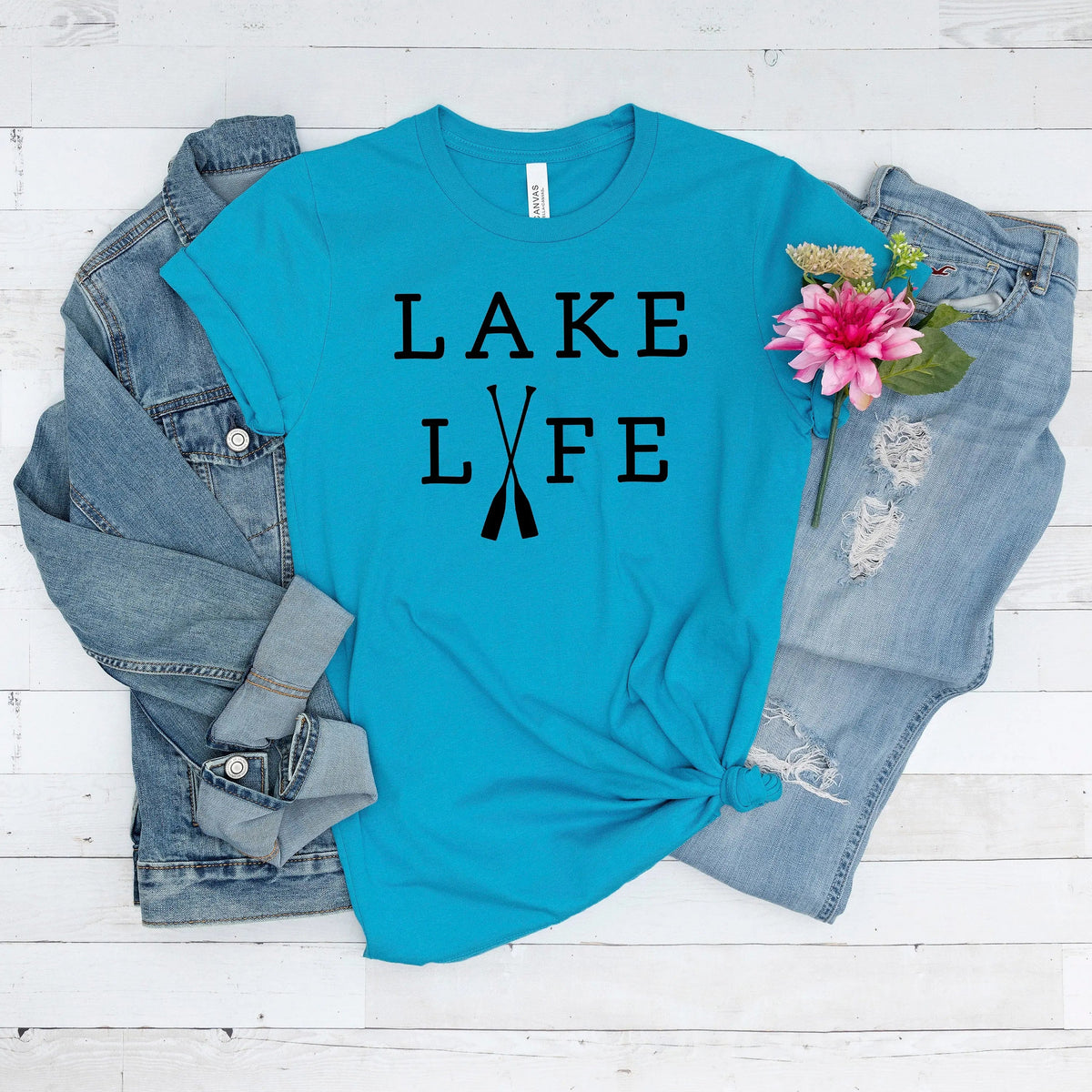 Teal unisex T-shirt with bold black “LAKE LIFE” text on the front