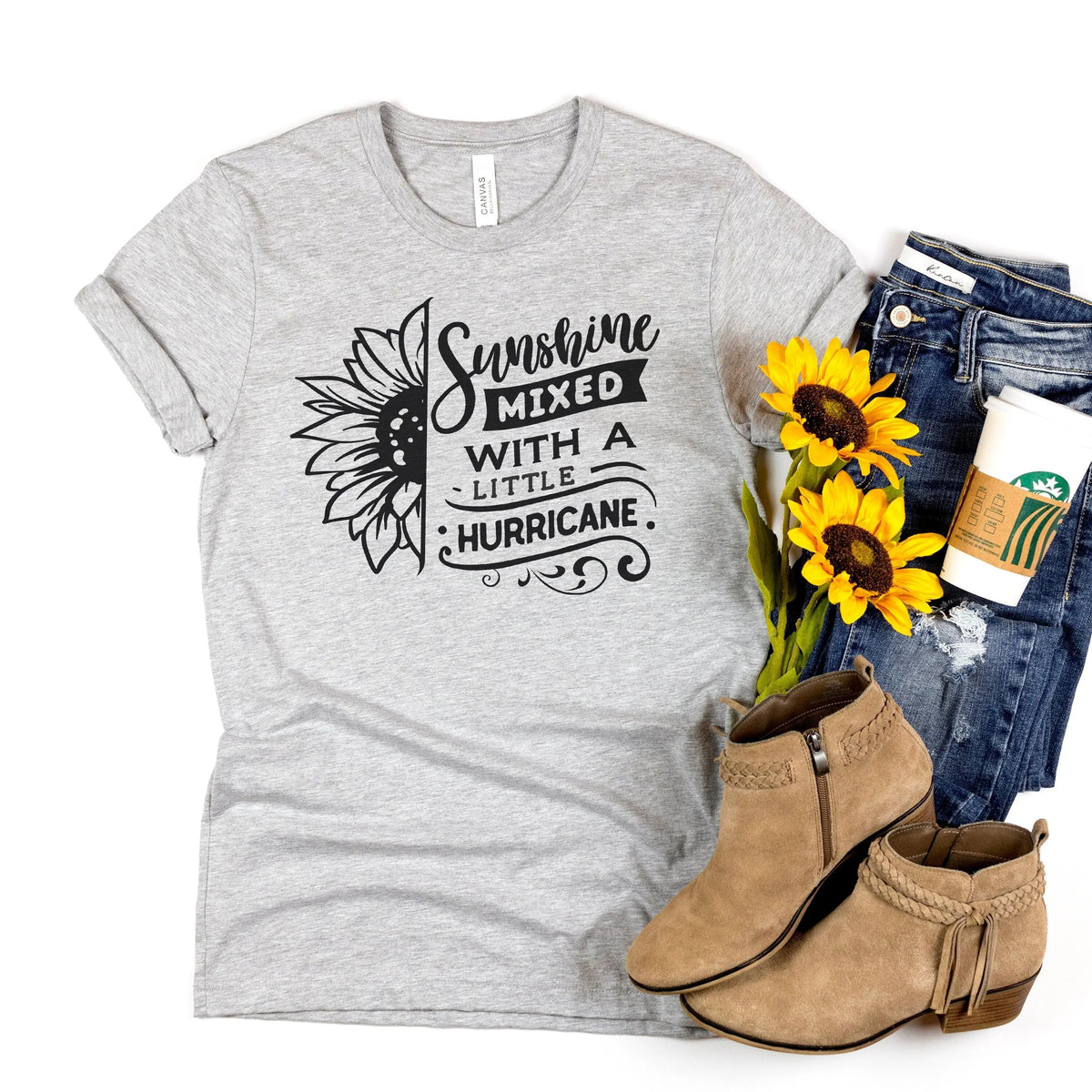Light gray unisex T-shirt with black sunflower “Sunshine” hurricane graphic