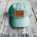 Aqua baseball cap with leather-look patch reading 'Dog Mom' with paw print