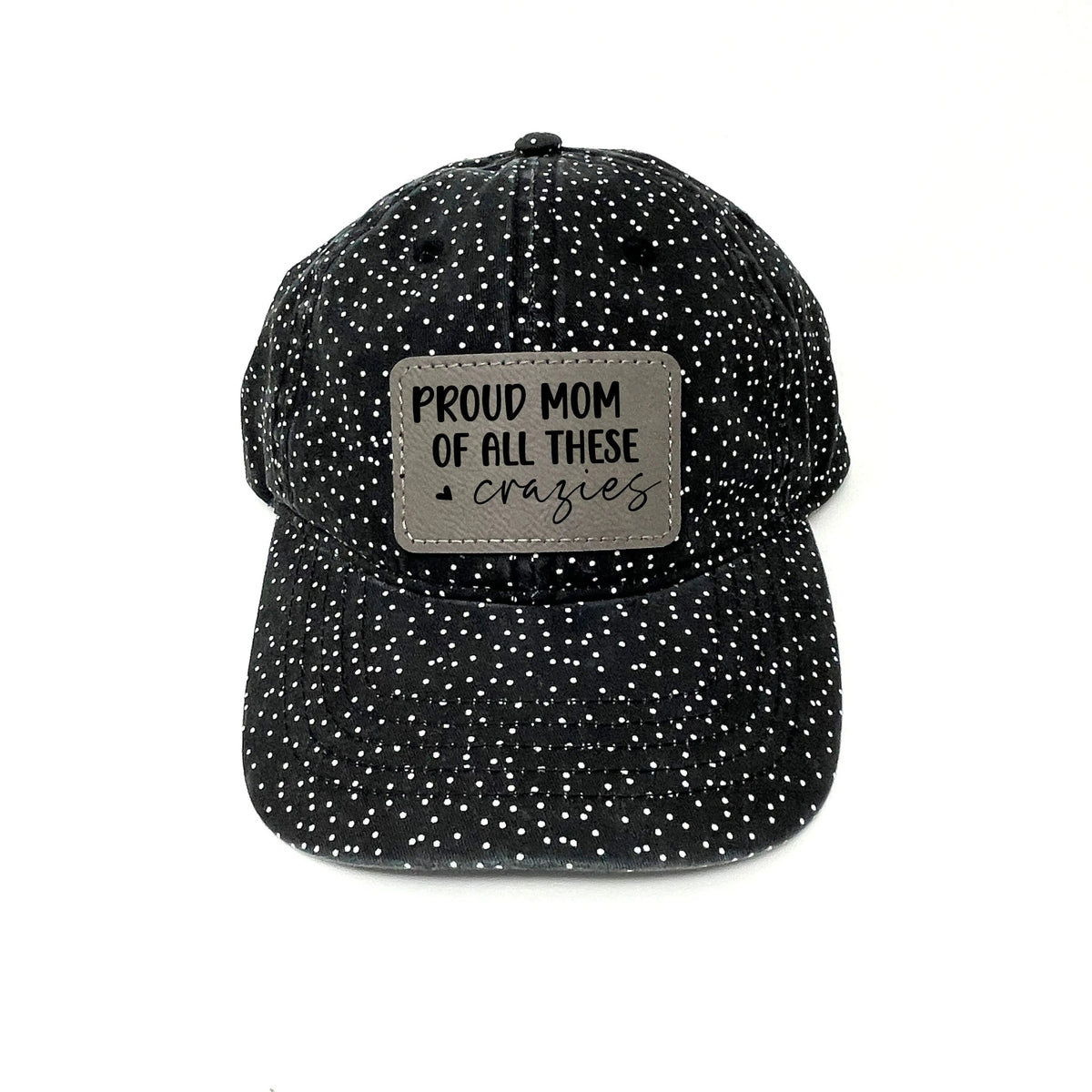 Black speckled trucker baseball cap with brown leather “Proud Mom” patch