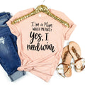 Pink unisex t-shirt with glitter gold-arch neckline and “I’m a Mom” quote graphic