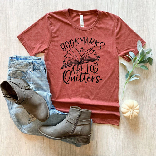 Maroon unisex t-shirt with 'Bookmarks are for Quitters' book graphic on front