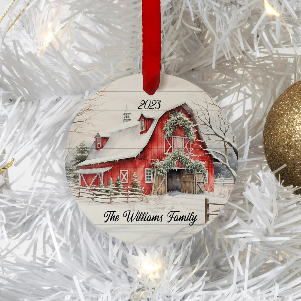 Personalized red barn Christmas ornament with tree, house scene, year 2023, and family name