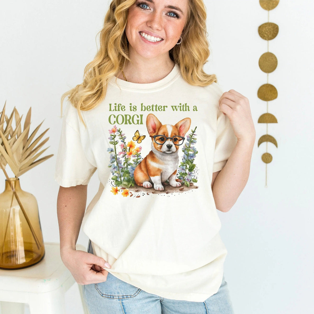 Ivory short-sleeve T-shirt with corgi graphic, floral border, crew neck