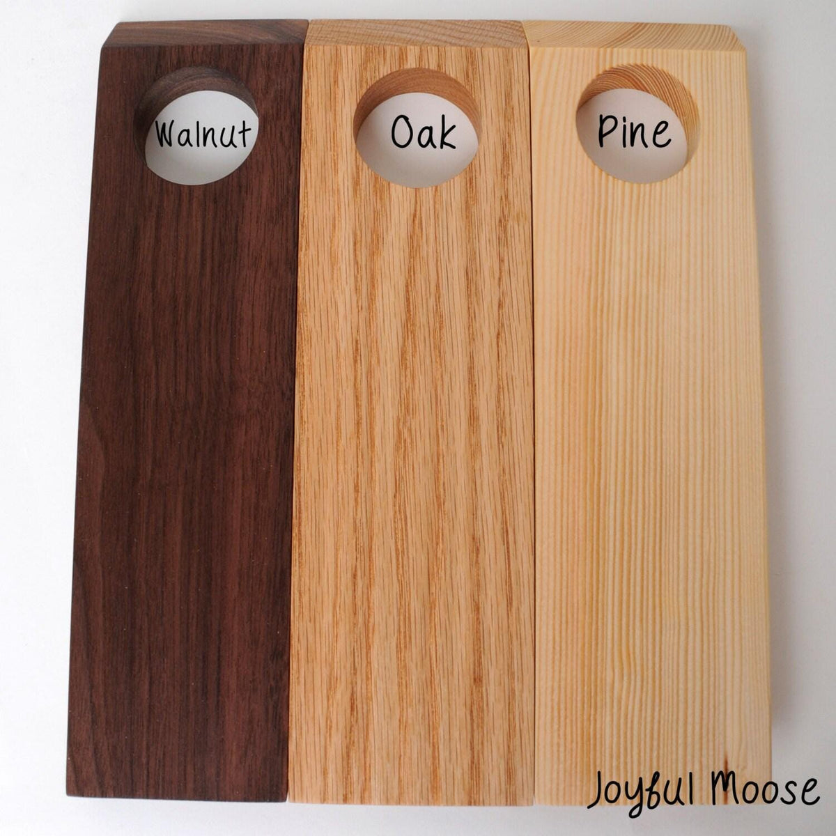 Wood wine bottle holder set with walnut, oak, and pine panels and round openings