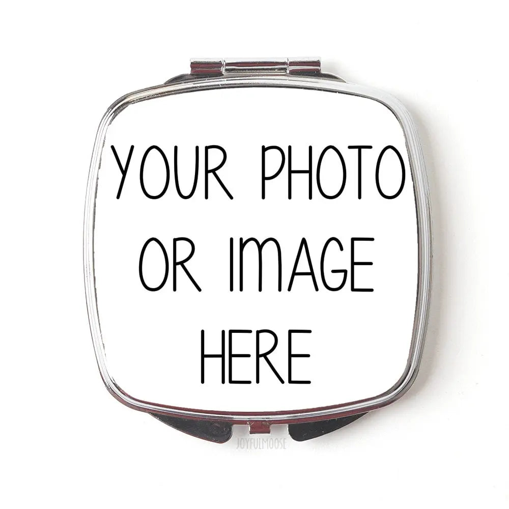 Silver compact mirror with “YOUR PHOTO OR IMAGE HERE” printed on the lid