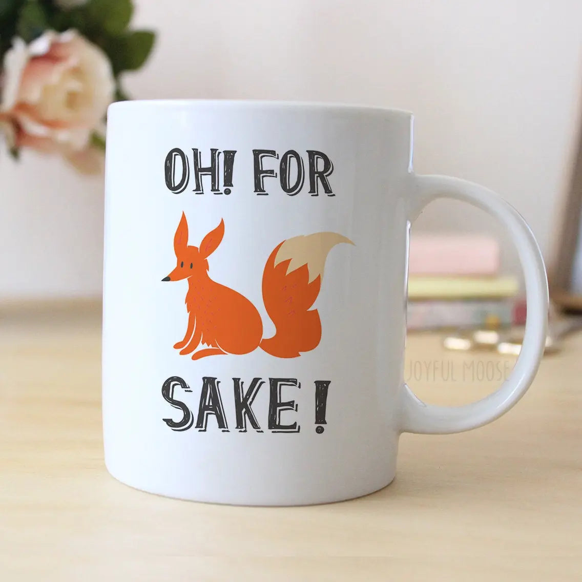White coffee mug with orange fox graphic and "OH! FOR SAKE!" text