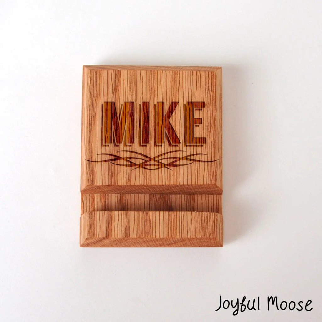 Engraved wood phone docking station block with decorative name line on front face