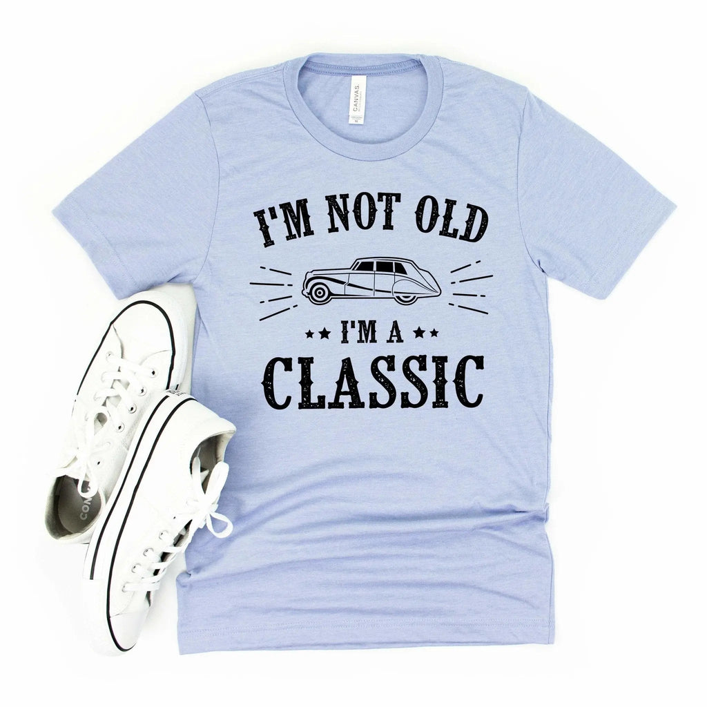 Light blue crewneck graphic T-shirt with vintage car and text 'I'm not old, I'm a classic'