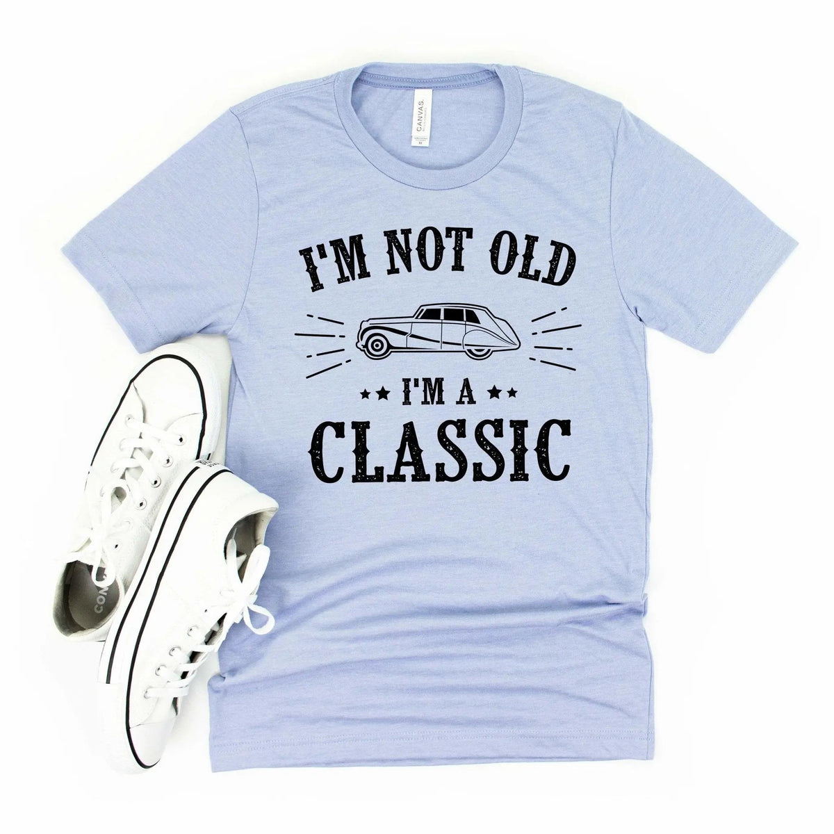 Light blue crewneck graphic T-shirt with vintage car and text 'I'm not old, I'm a classic'