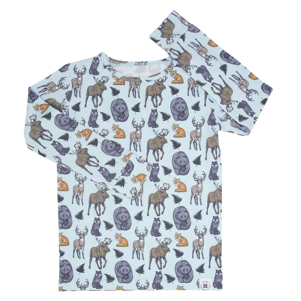 Long-sleeve kids pajama top, light blue animal print with rounded neckline