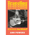 Hardcover music biography book cover with woman holding acoustic guitar